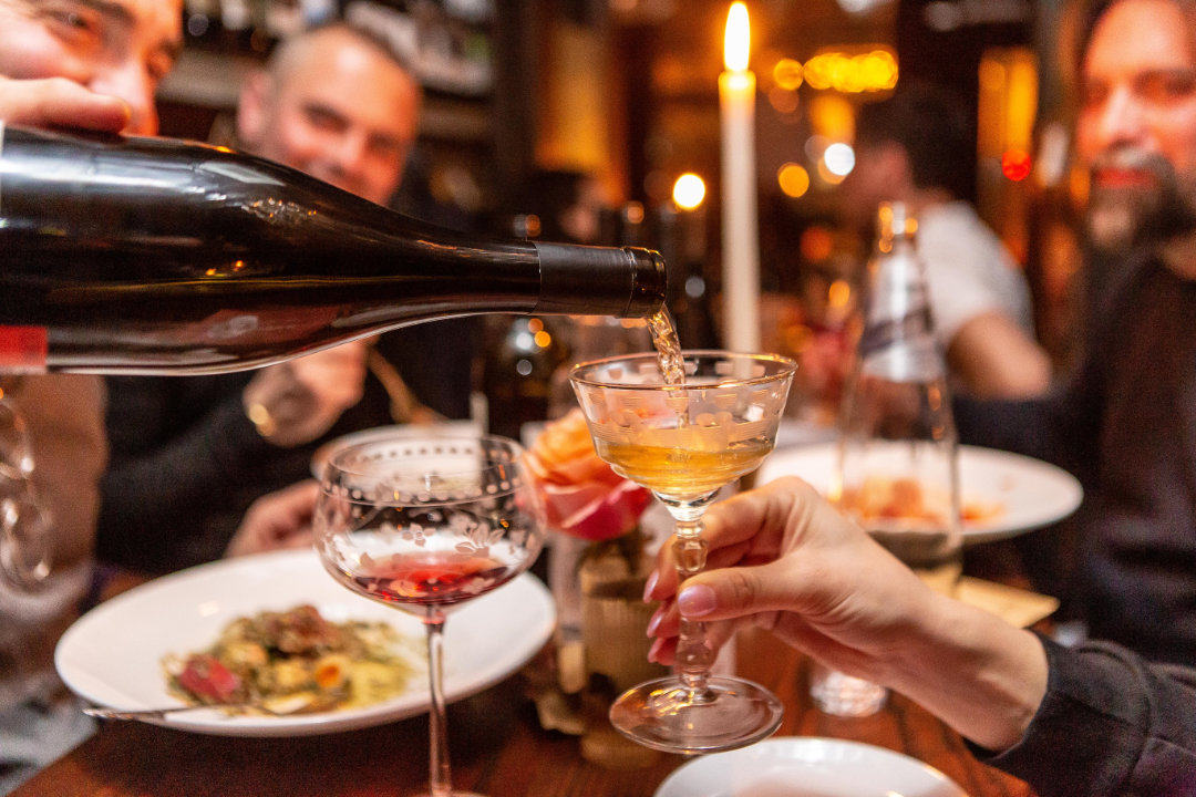 People toasting with wine
